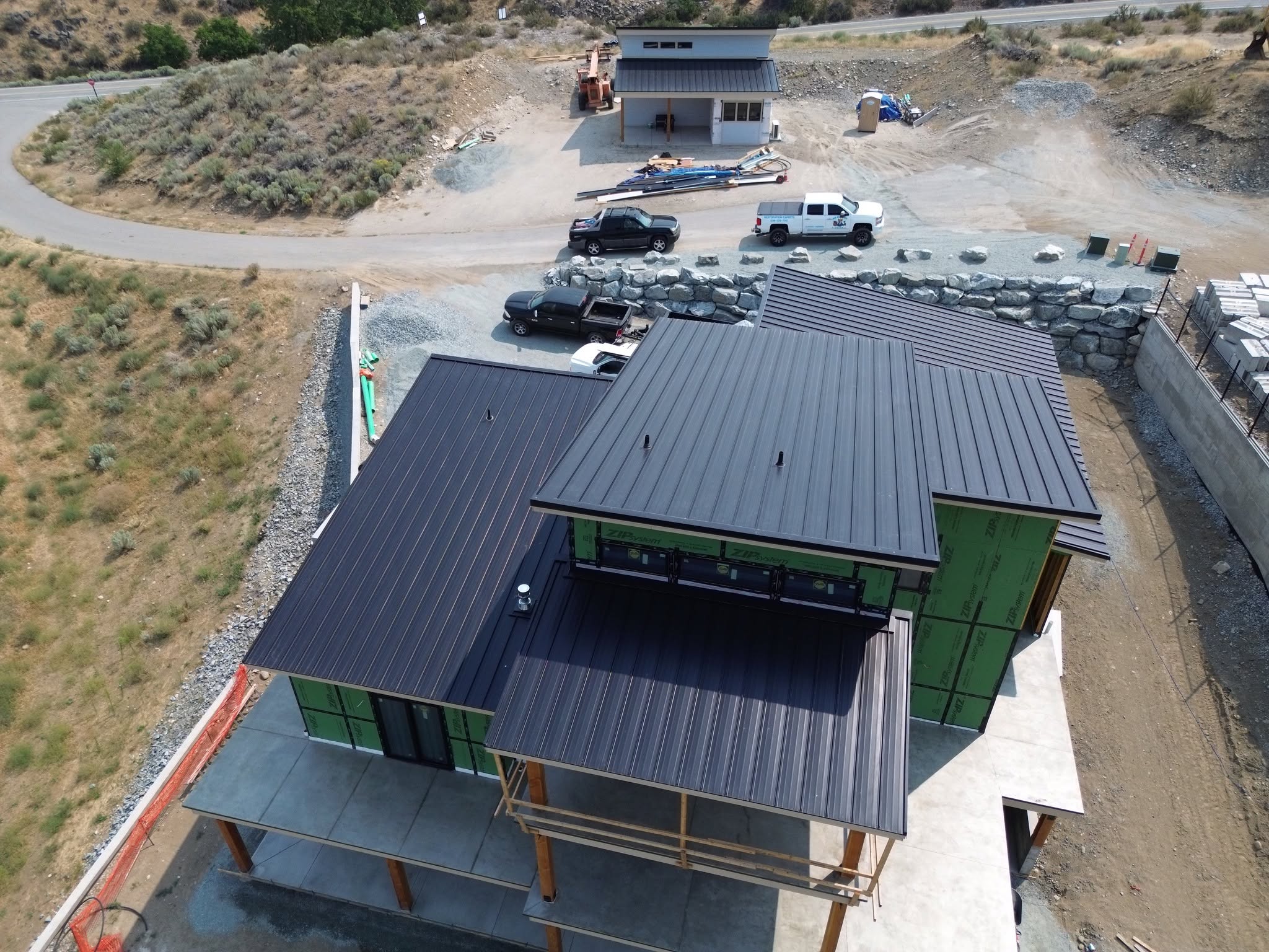 metal roof black standing seam modern home lake 6